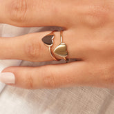 14k Yellow Gold Heart Stackable Ring on woman's finger